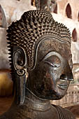 Vientiane, Laos - Wat Si Saket, The gallery around the sim houses thousands of Buddha statues in various mudras, dating  from the 16th century.